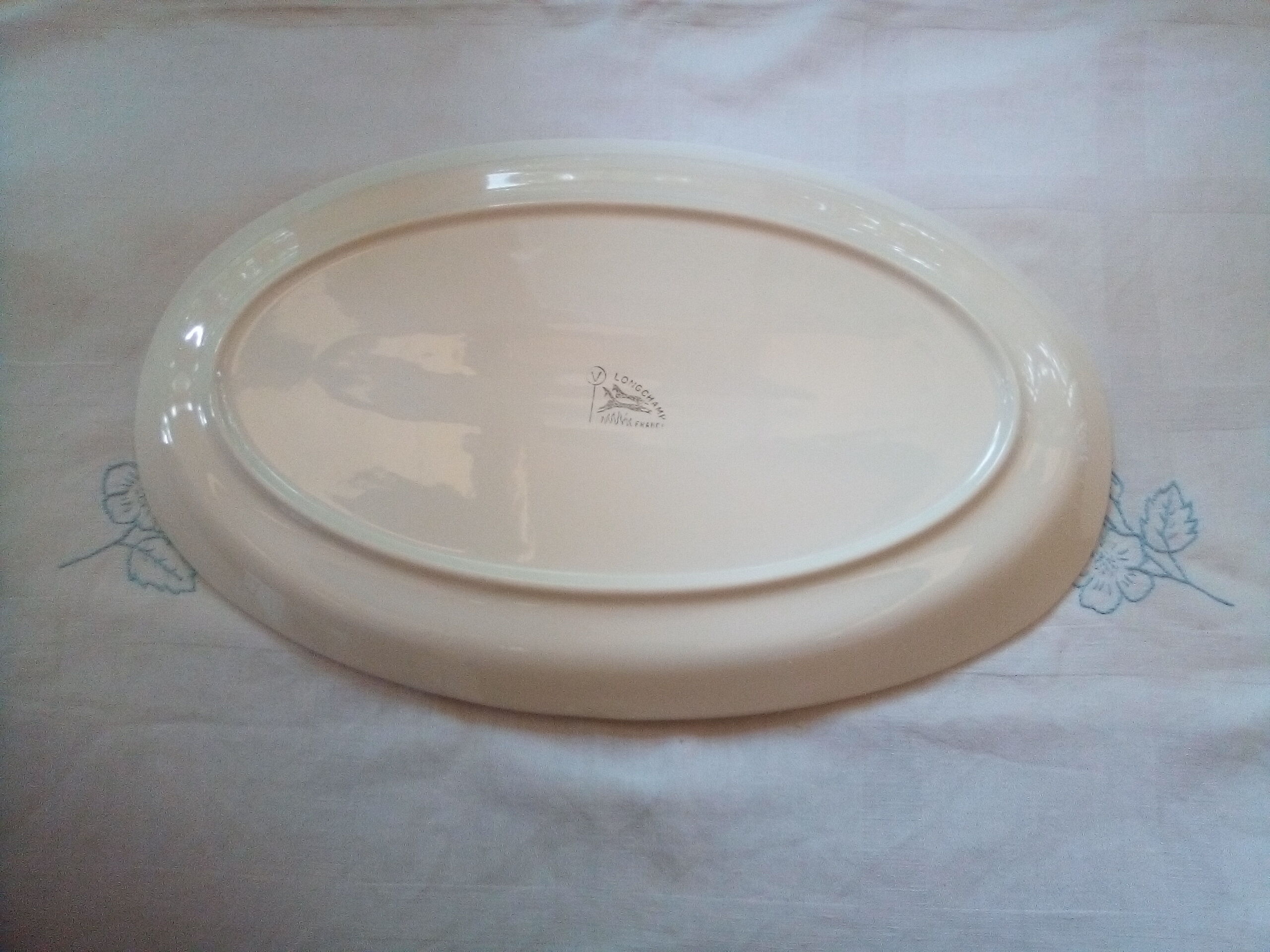 Set of 12 Longchamp plates and fish dish
