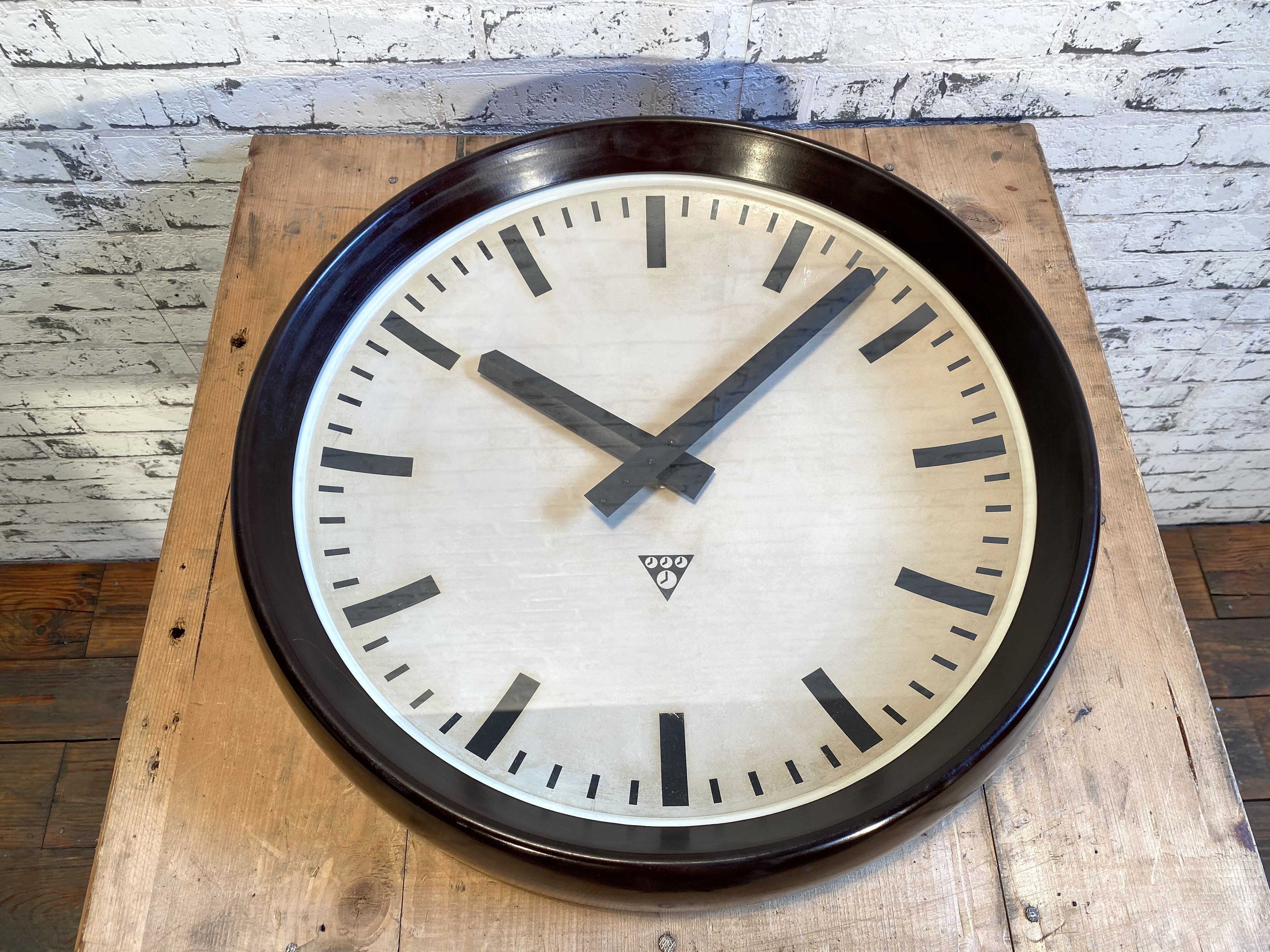 Industrial bakelite factory wall clock from Pragotron, 1960s