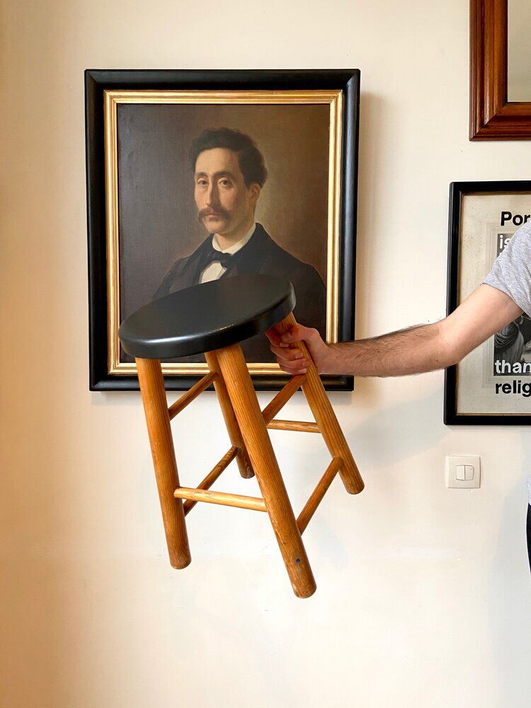 Light and black wooden stool