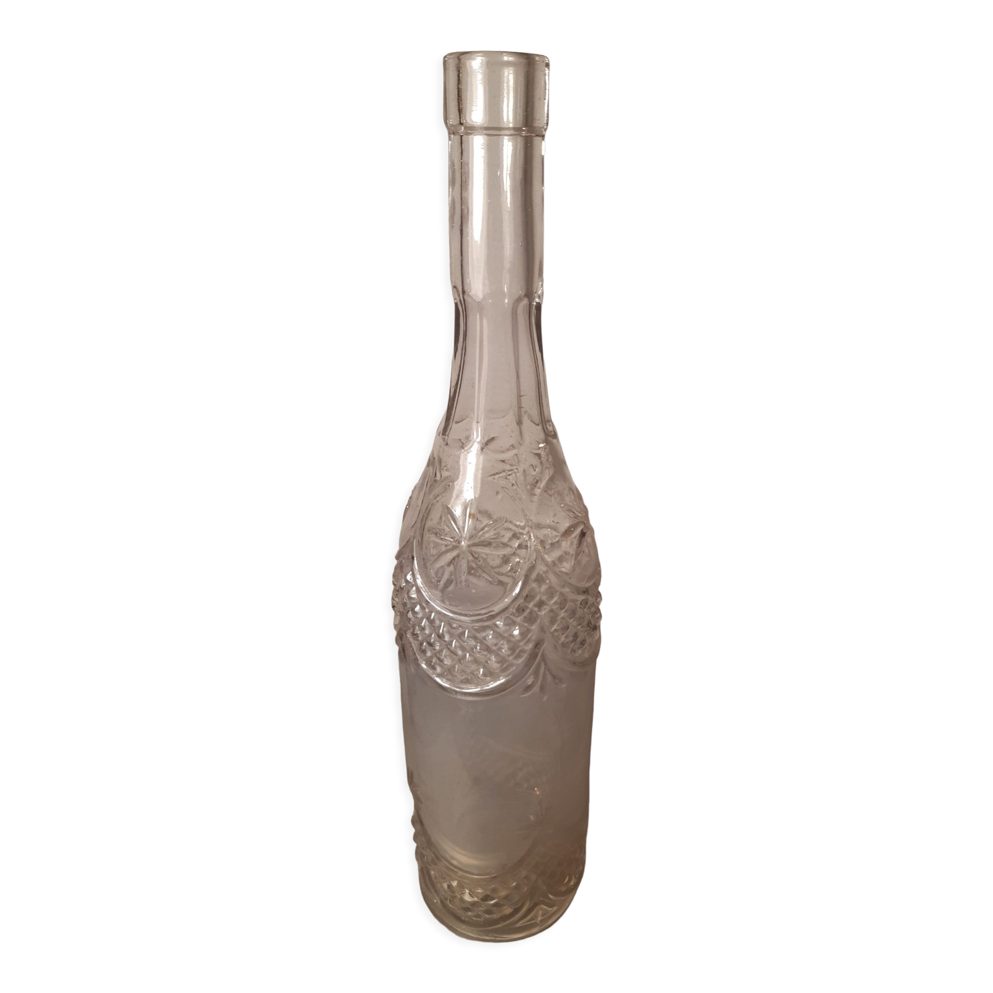 Engraved antique bottle
