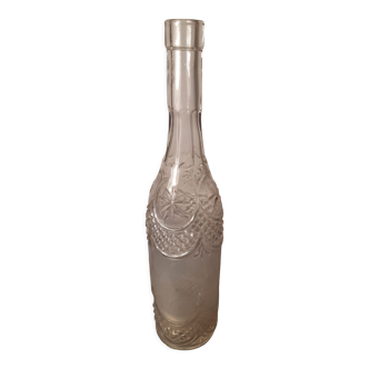 Engraved antique bottle