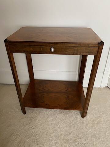Walnut veneer pedestal table.