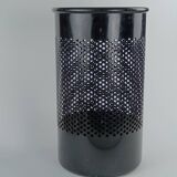 Perforated metal wastebasket