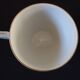 Set of six Art Deco white fine porcelain coffee cups and saucers