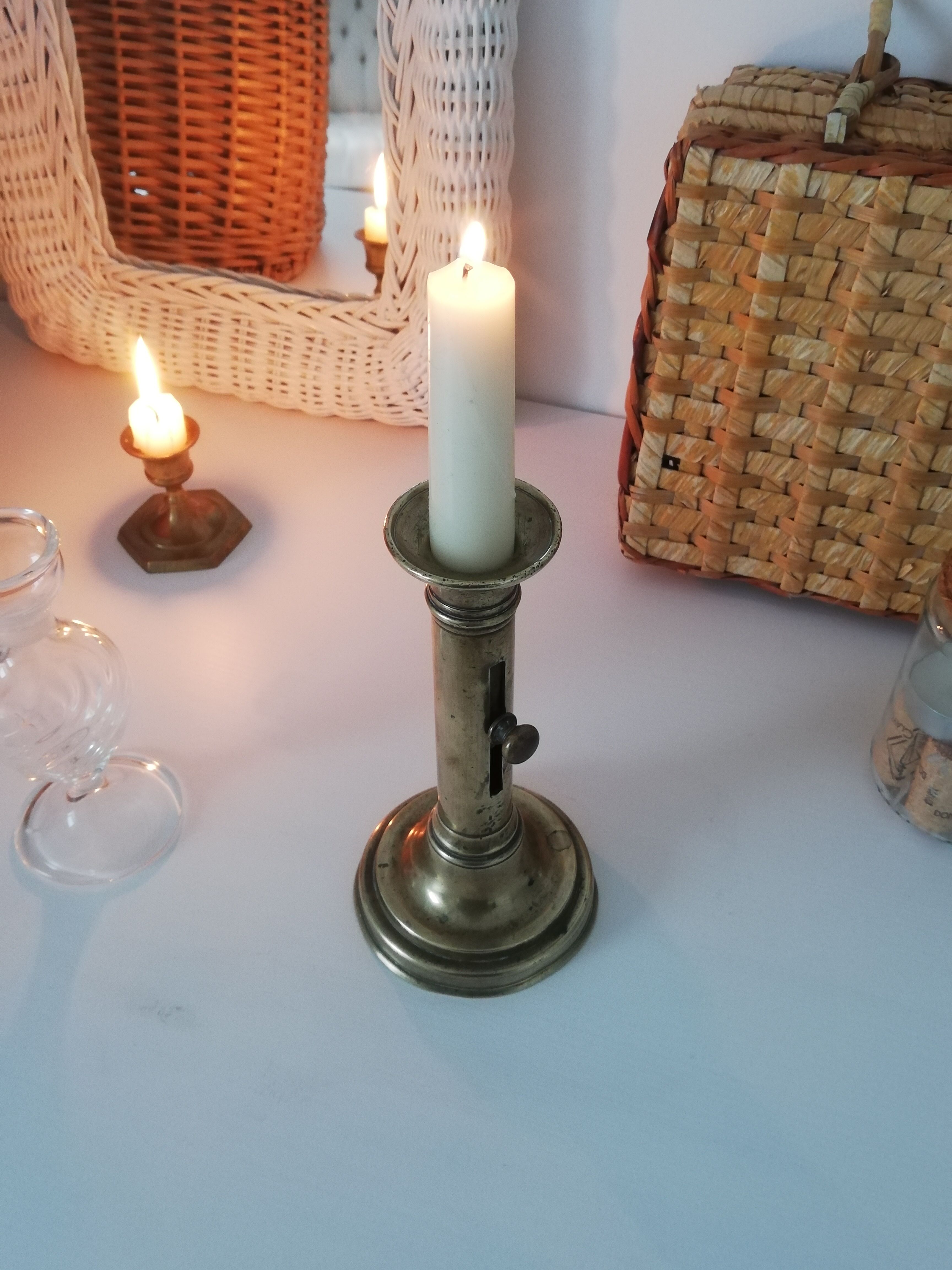 Vintage push candle holder