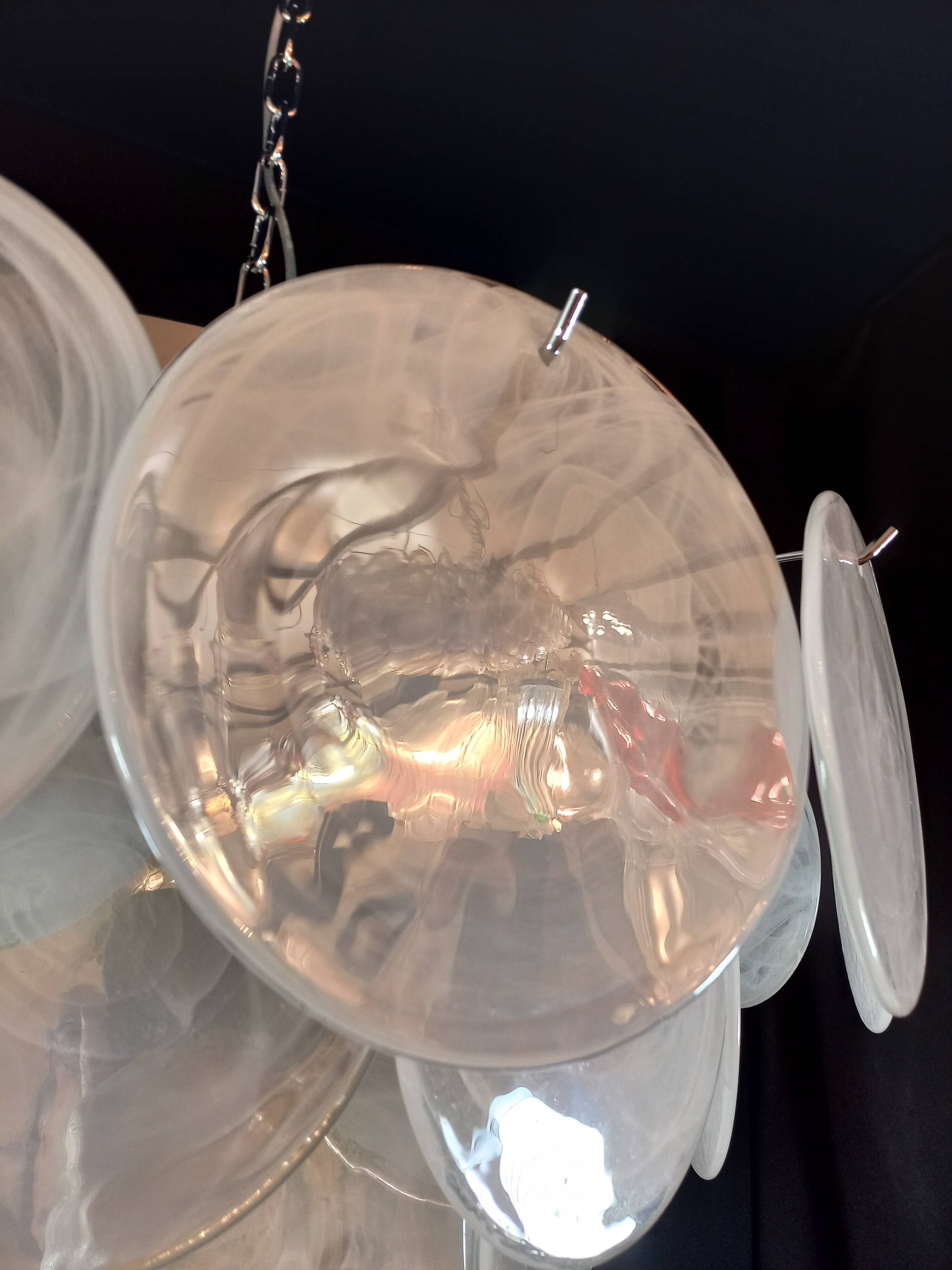 Handcrafted chandelier with Murano glass and handmade alabaster discs.