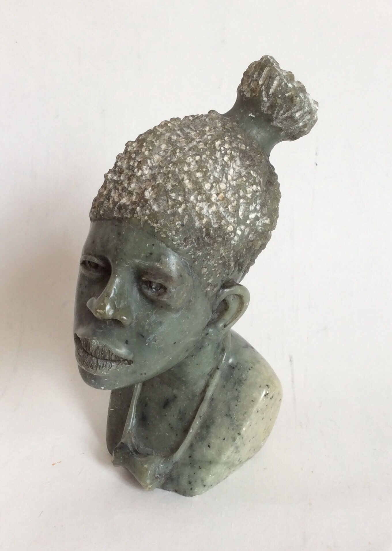 African stone bust