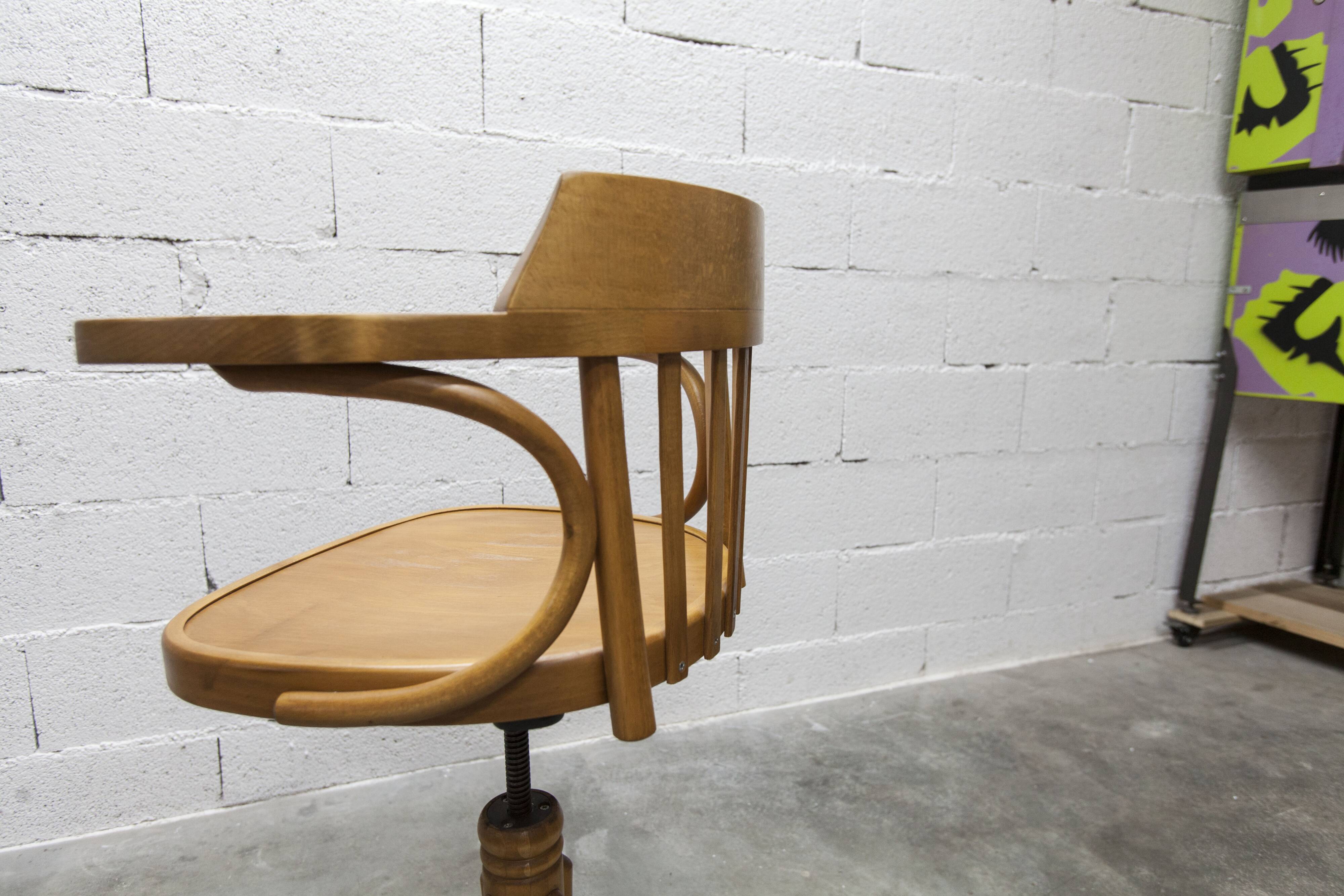Scandinavian 1960s curved wood swivel office chair