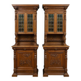 Important pair of two-body buffets in richly carved Renaissance style.