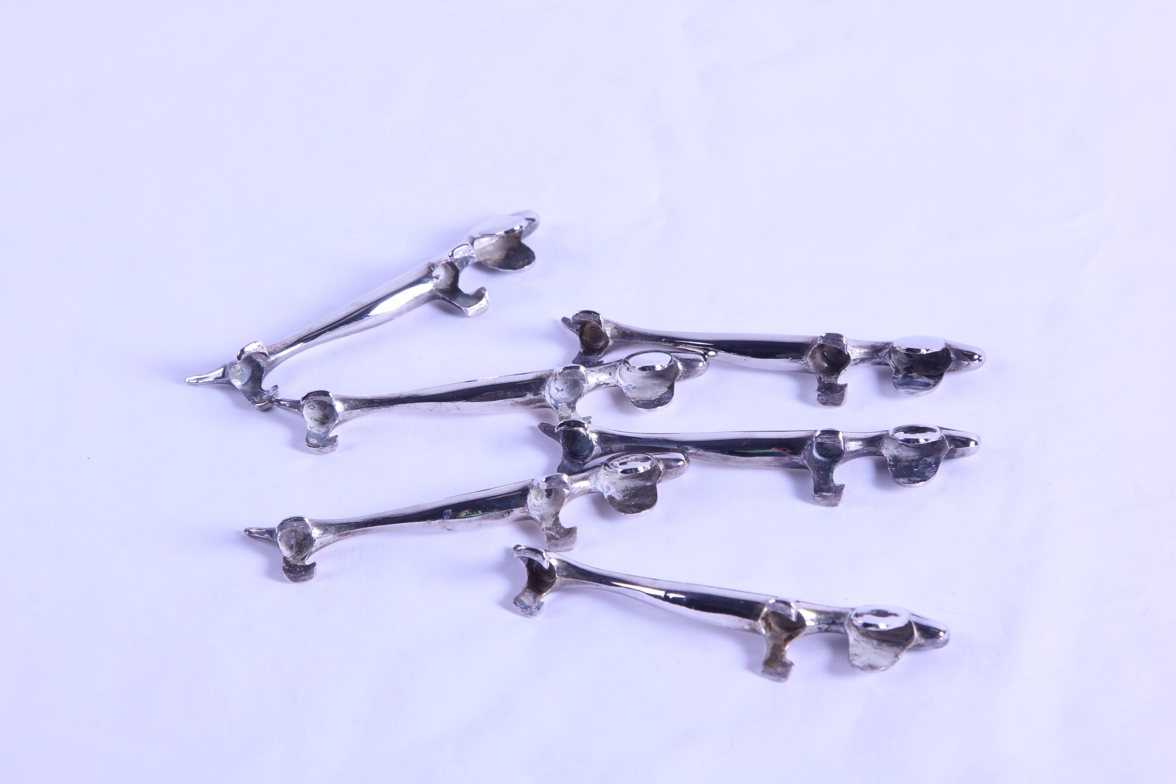 6 vintage metal dog-shaped knife holders