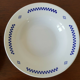 Hollow plates in earthenware Lustucru décor vintage checkerboard blue tiles