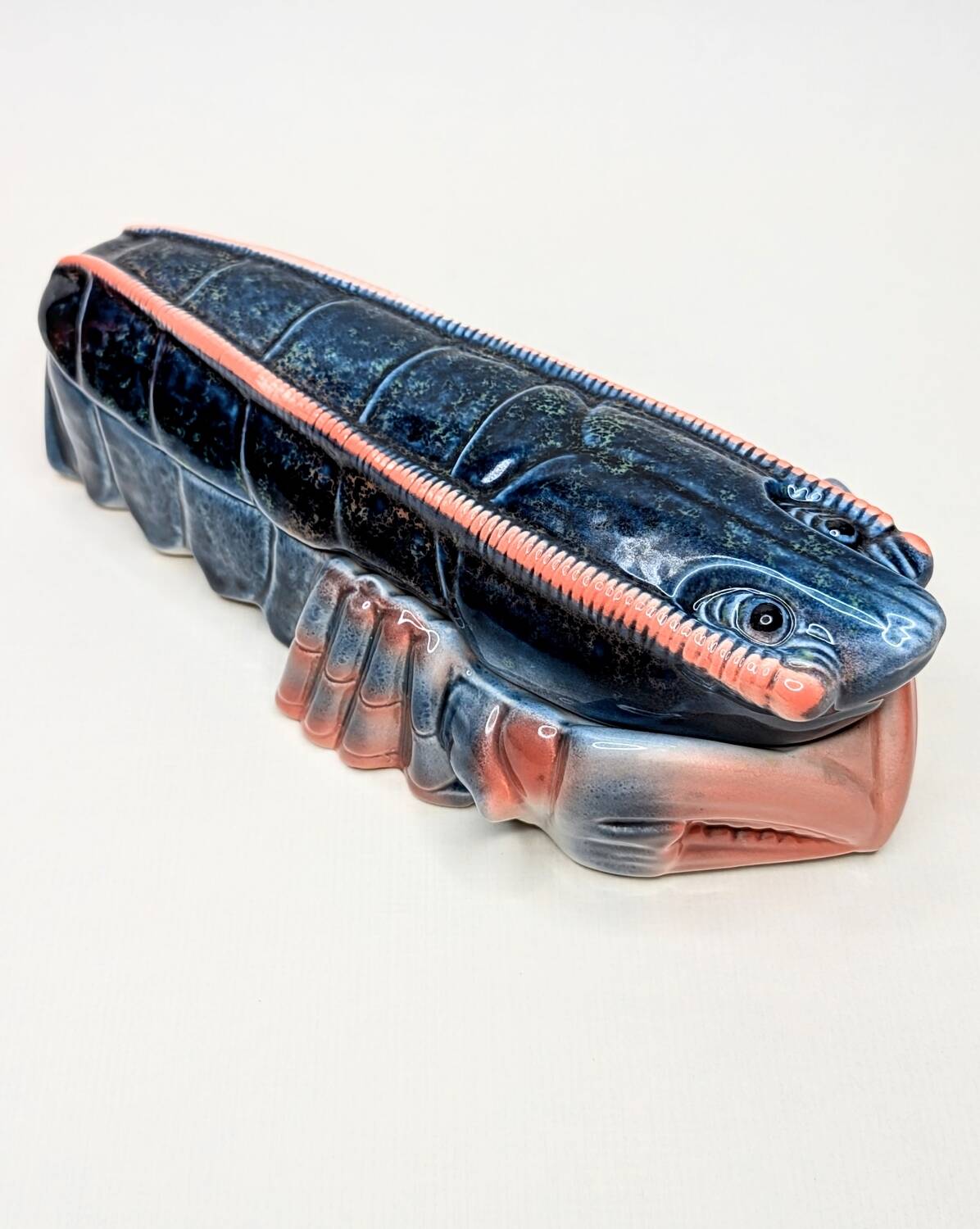 Lobster barbotine signed Michel Caugant midnight blue / coral