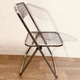 4 chrome folding chairs by Talin Cornedo