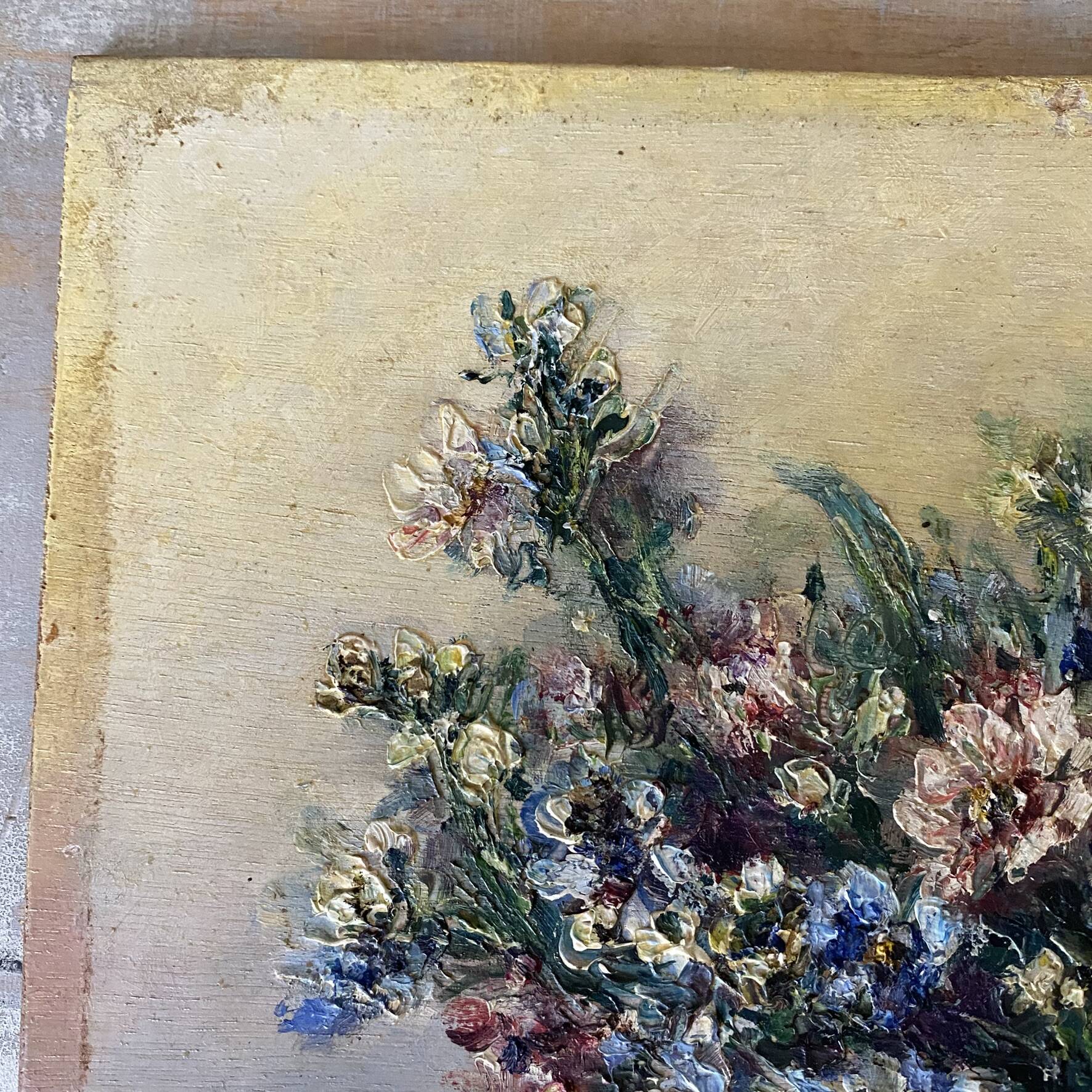 Old painting of a bouquet of flowers, oil on wood.