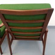 Pair of vintage Scandinavian armchairs in teak and green fabric from the 1960s.