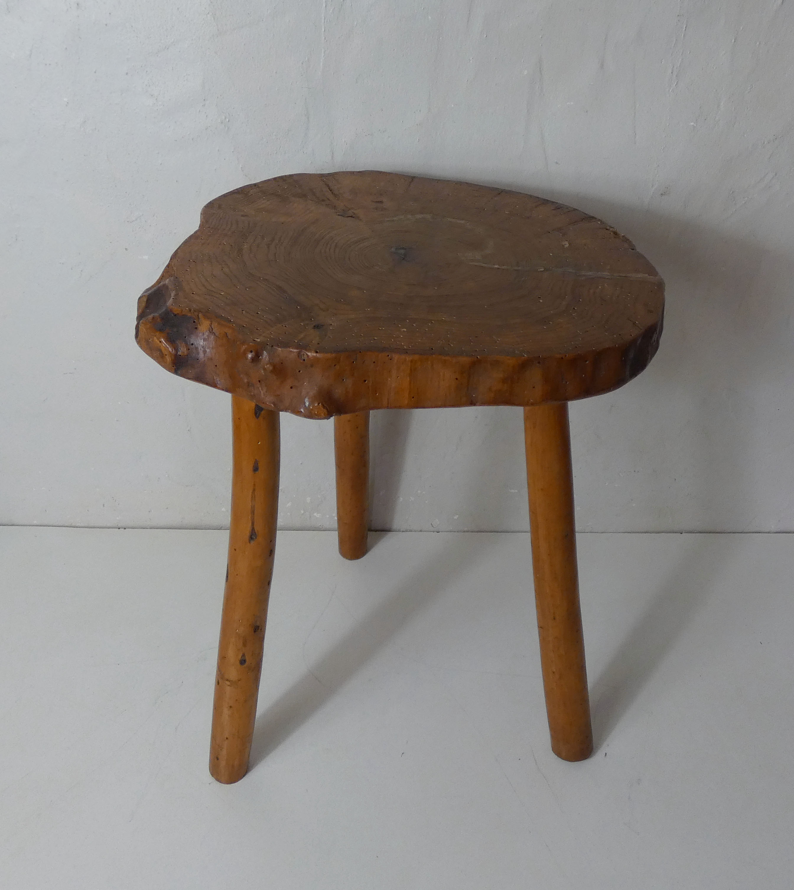 Brutalist side table tripod in vintage wood