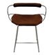 Sculptural bar stool with a silver metal back and old cognac leather.