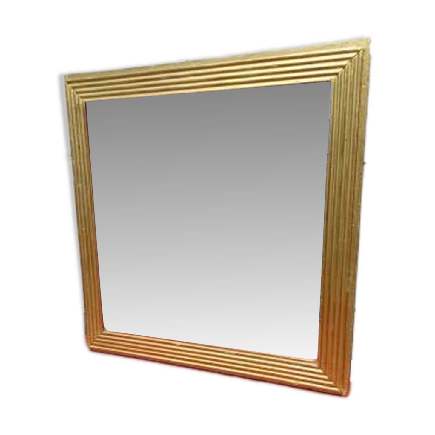 Wooden mirror and gold trim