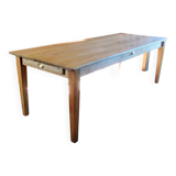 Solid oak farmhouse table with central drawer and extension
