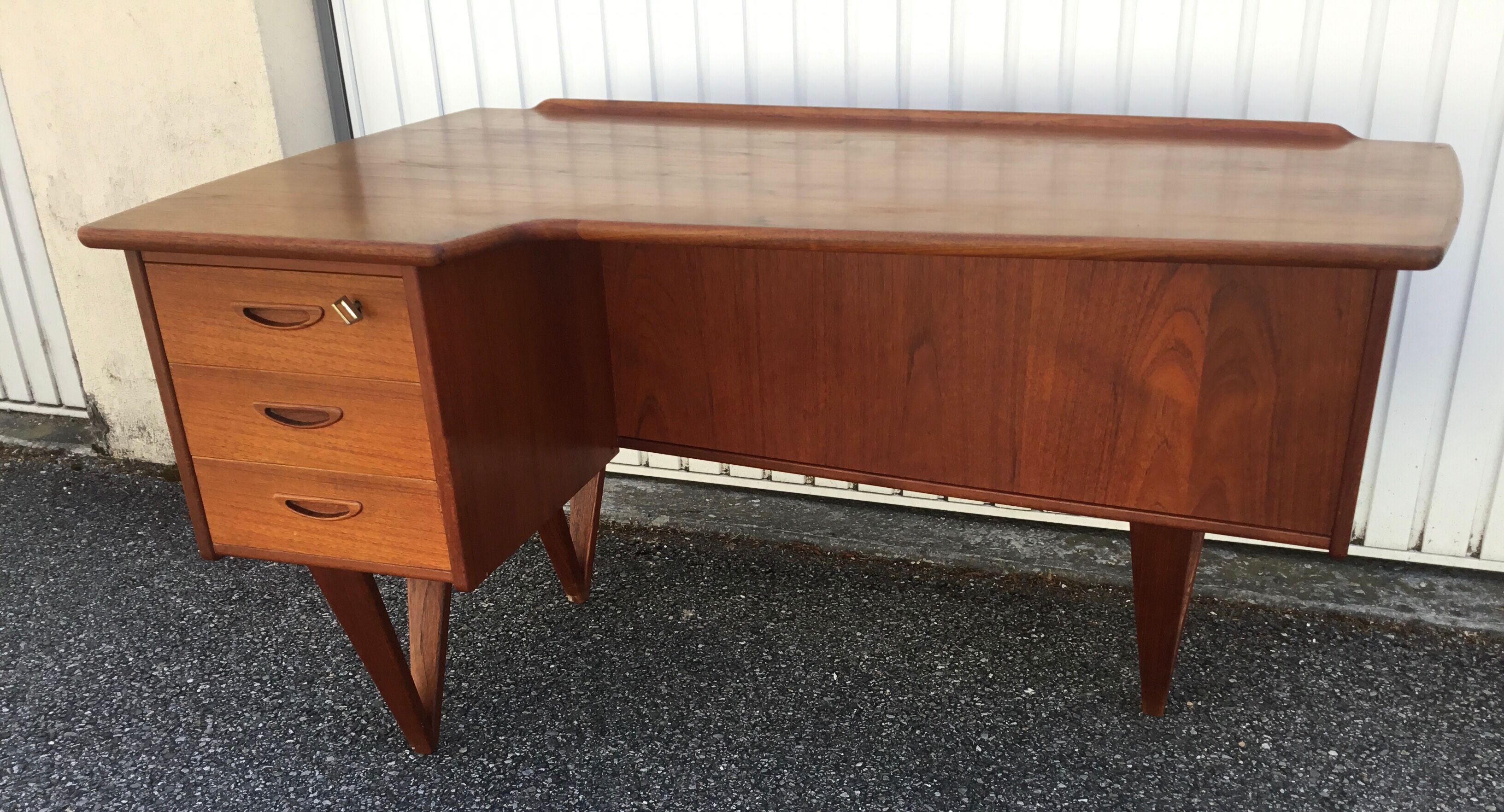 Peter Lovig Nielsen's Scandinavian teak boomerang desk from the 60s
