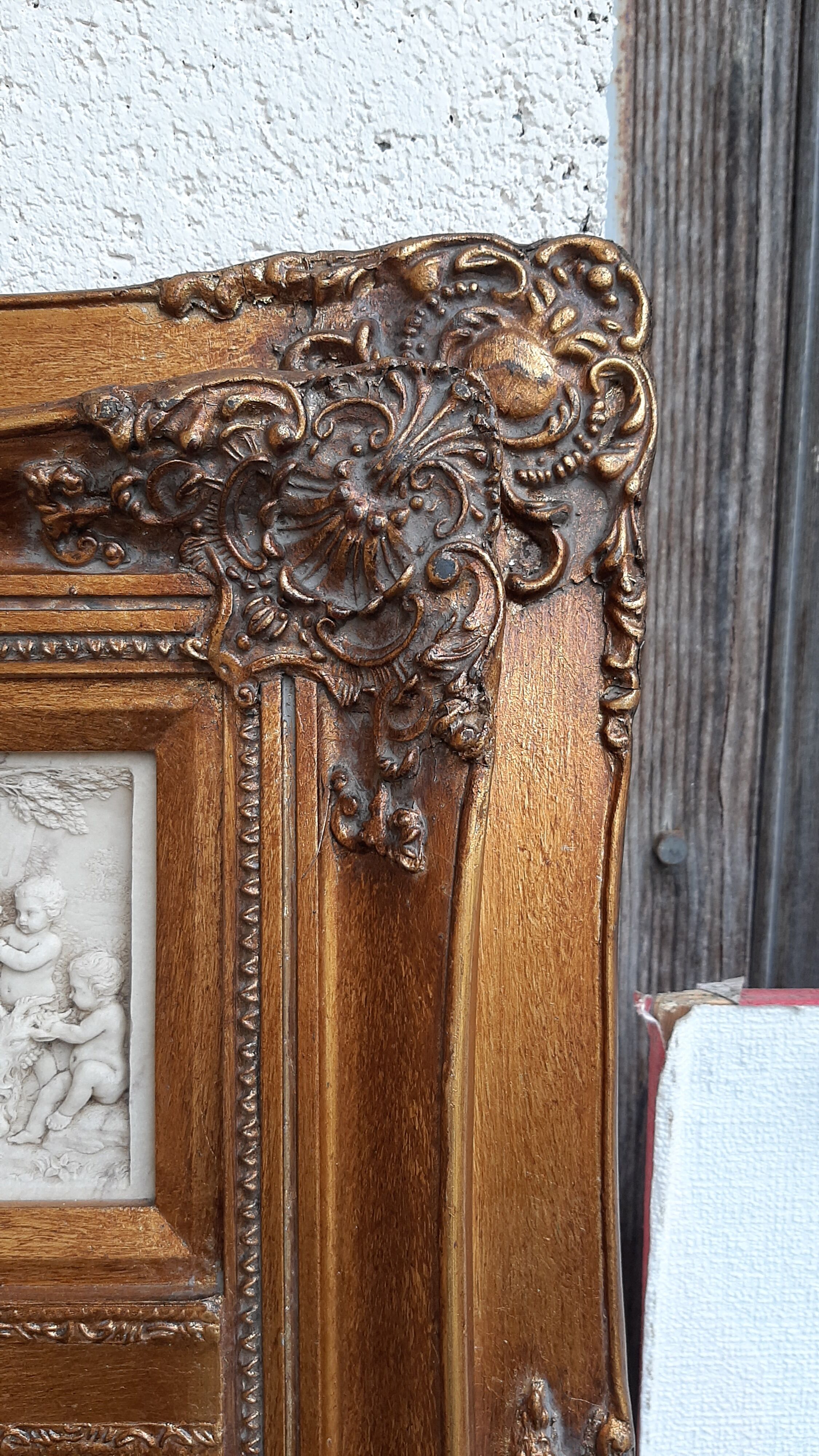 Trumeau miroir  dore biseaute 74 cm x 42 cm decor stuc