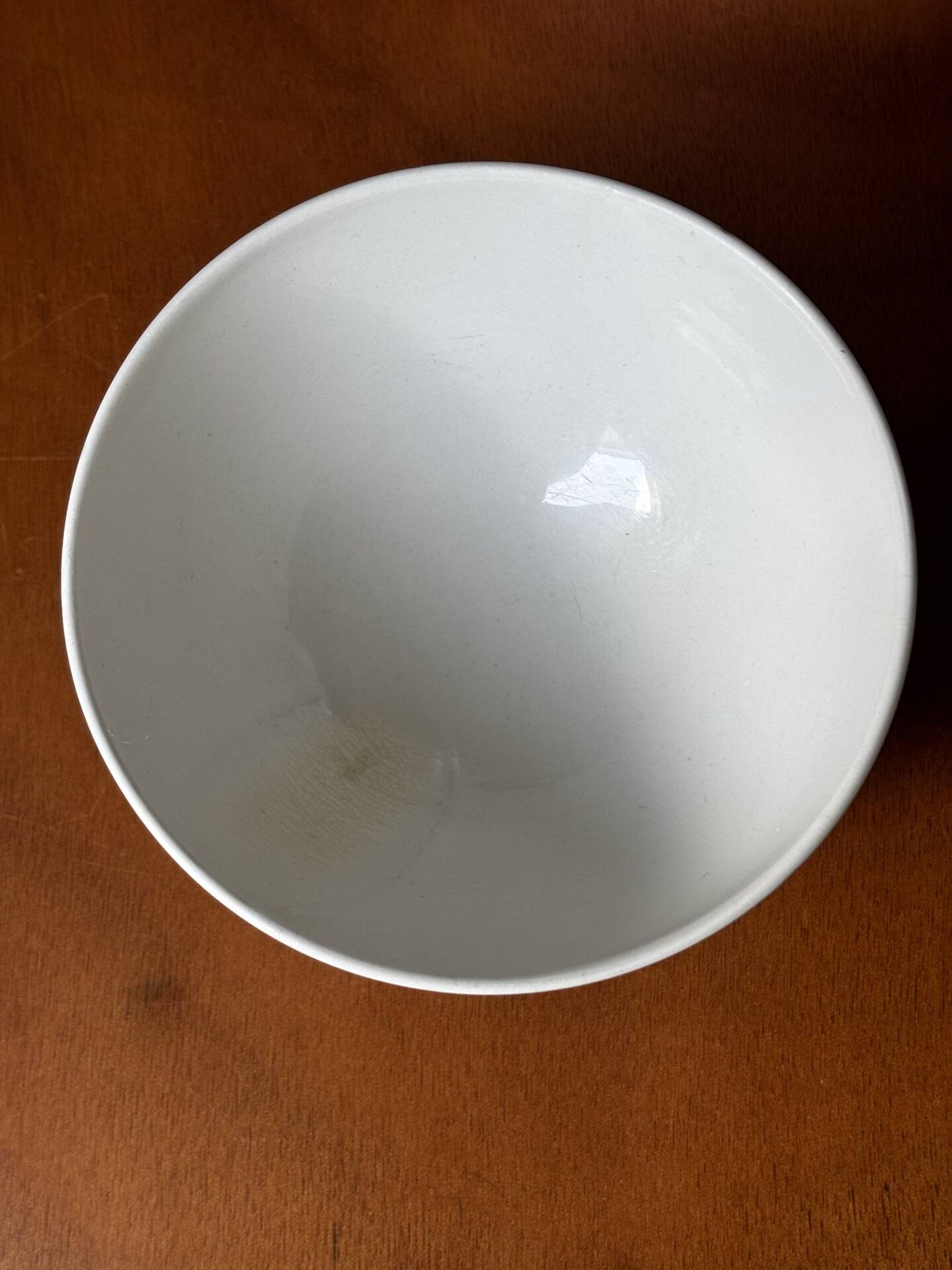Old faceted bowl in pink earthenware