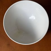 Old faceted bowl in pink earthenware