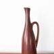 Brown glazed ceramic vase by Gunnar Nylund for Rörstrand.