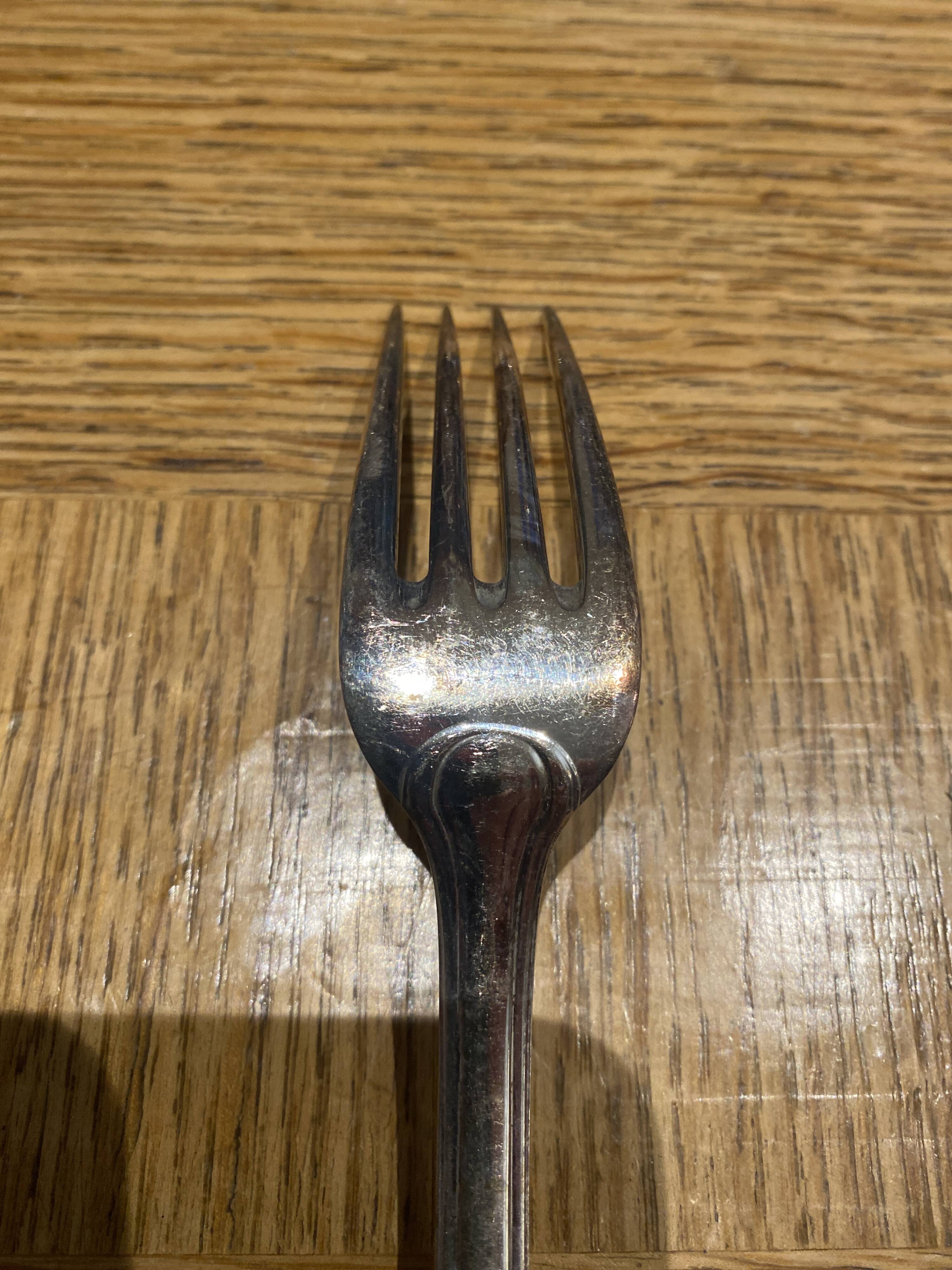 12 large silver metal forks