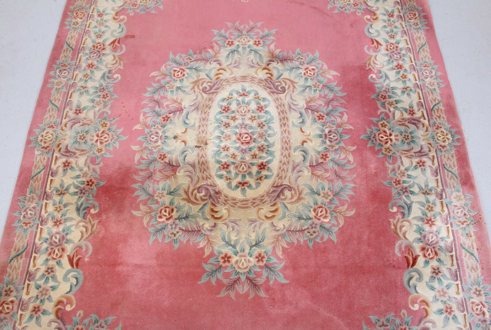 Chinese fringed wool rug with floral pattern on pink background 388x275cm
