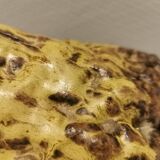 Ceramic table lamp, in greenish/brownish glaze, almost in the shape of a volcano.