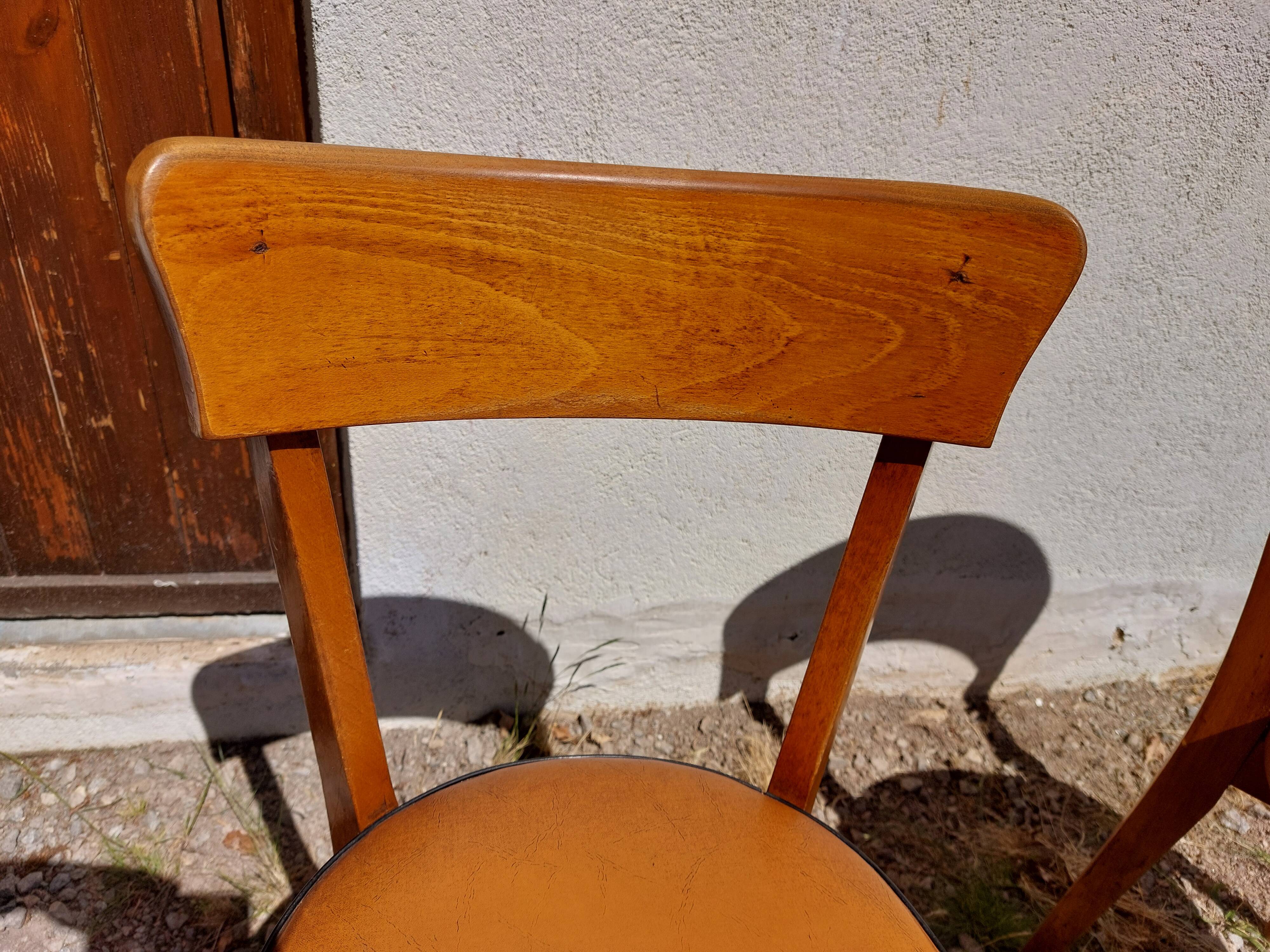 6 vintage 1960s wooden bistro chairs with camel faux leather.