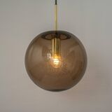 Large smoked glass ball pendant by Limburg in brass, Germany, 1970s.