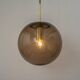 Large smoked glass ball pendant by Limburg in brass, Germany, 1970s.