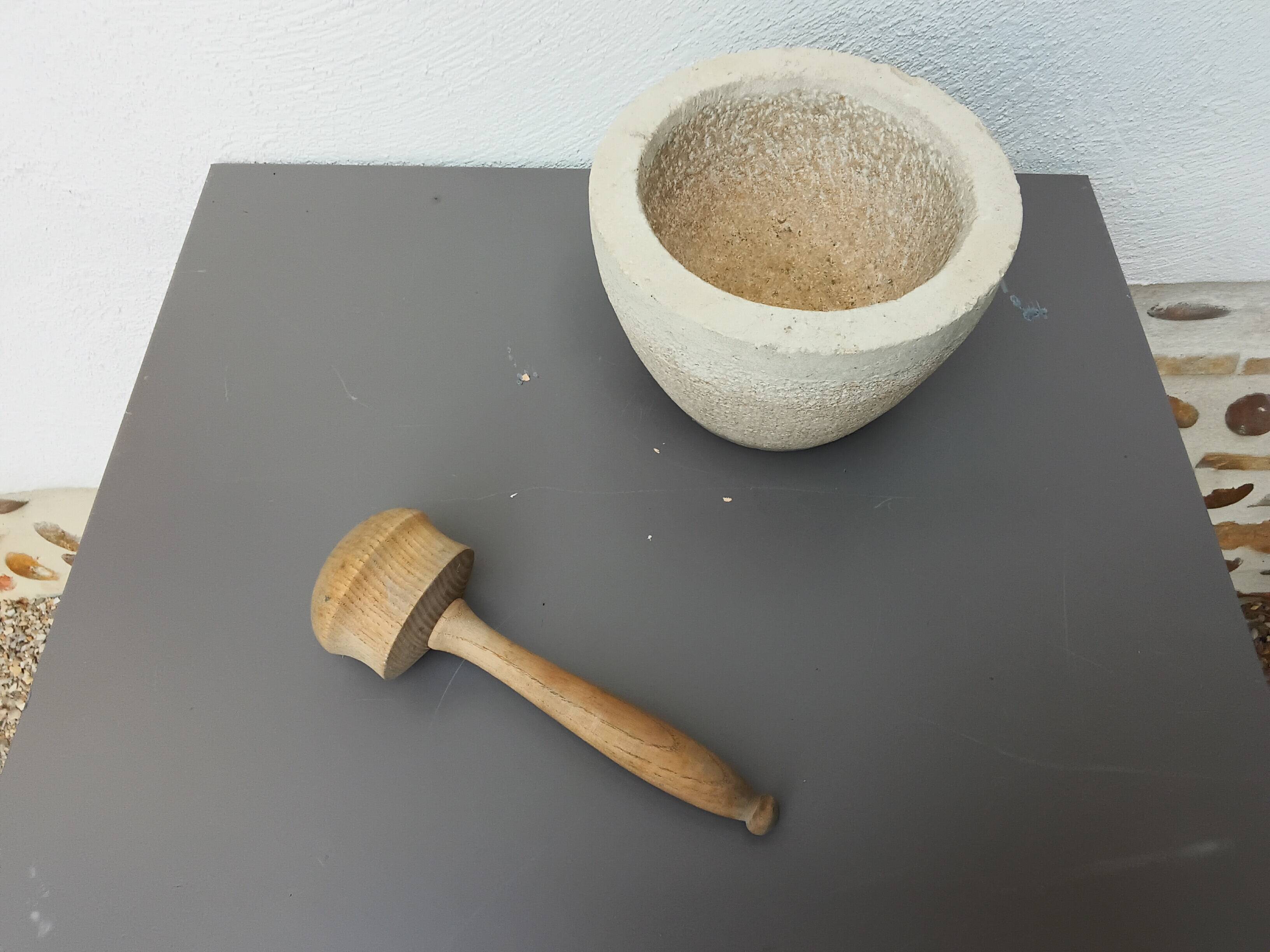 Stone mortar with wooden pestle