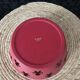 Rose metal catch-all with character inclusions by A di Alessi, 9cm high x 21.5cm diameter.