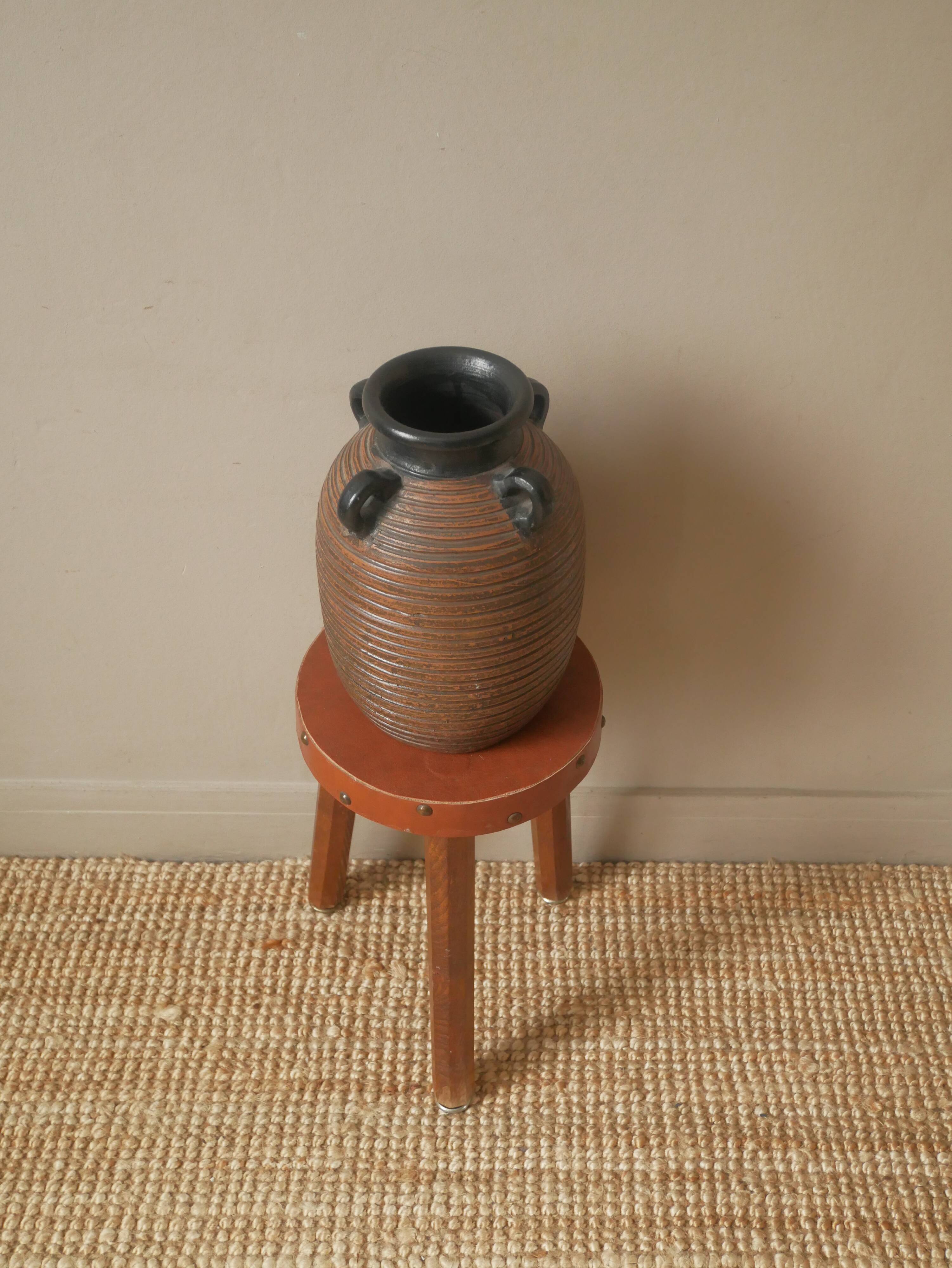 Vase with handles in vintage ceramic handmade pottery tribal ethnic decoration