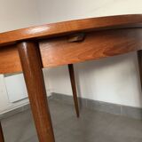 Scandinavian round teak dining table from the 60s extendable