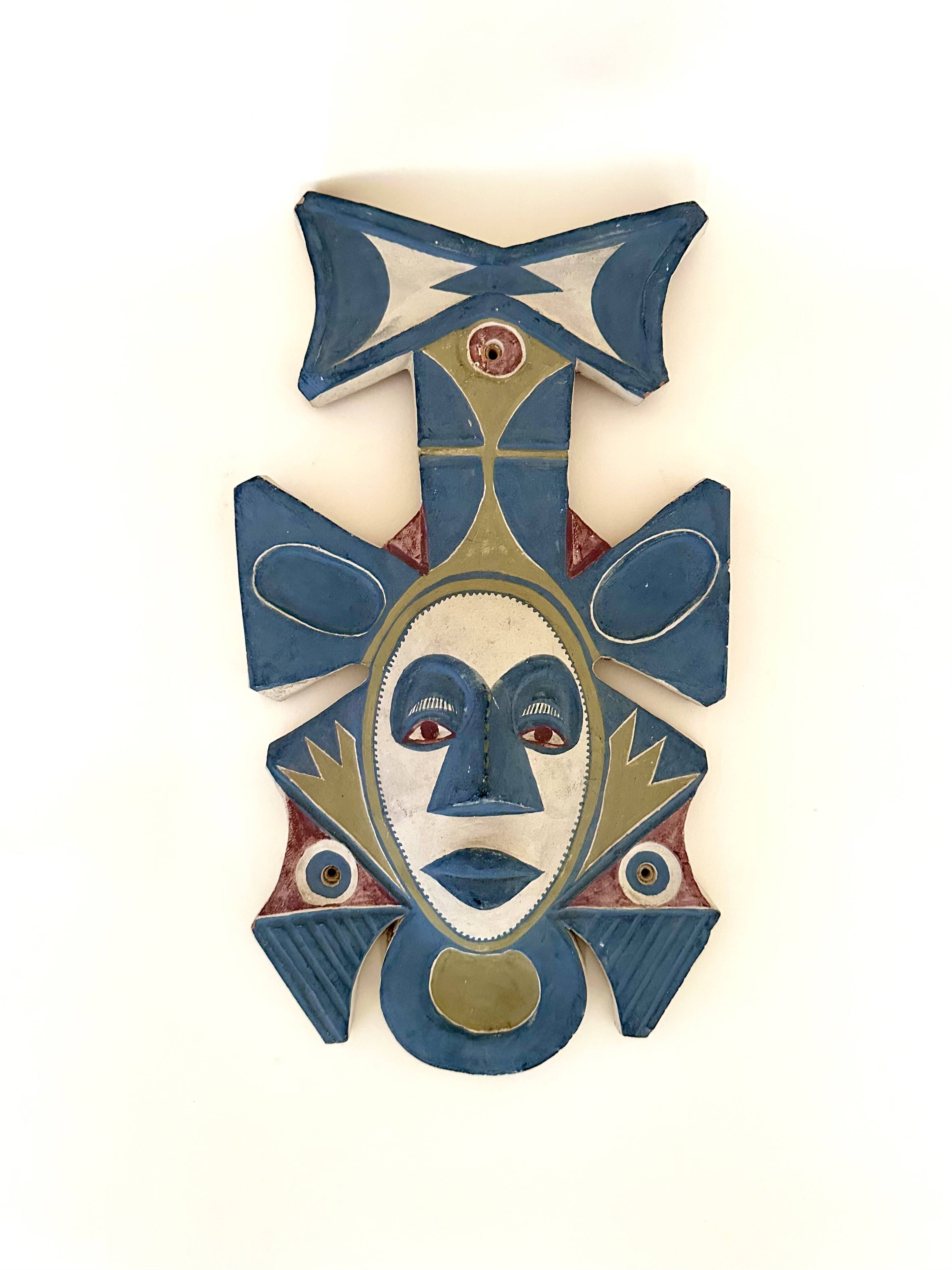 Painted terracotta wall mask