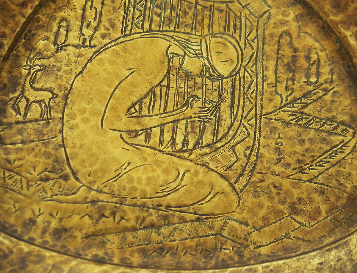 Glove in brassware by Loys