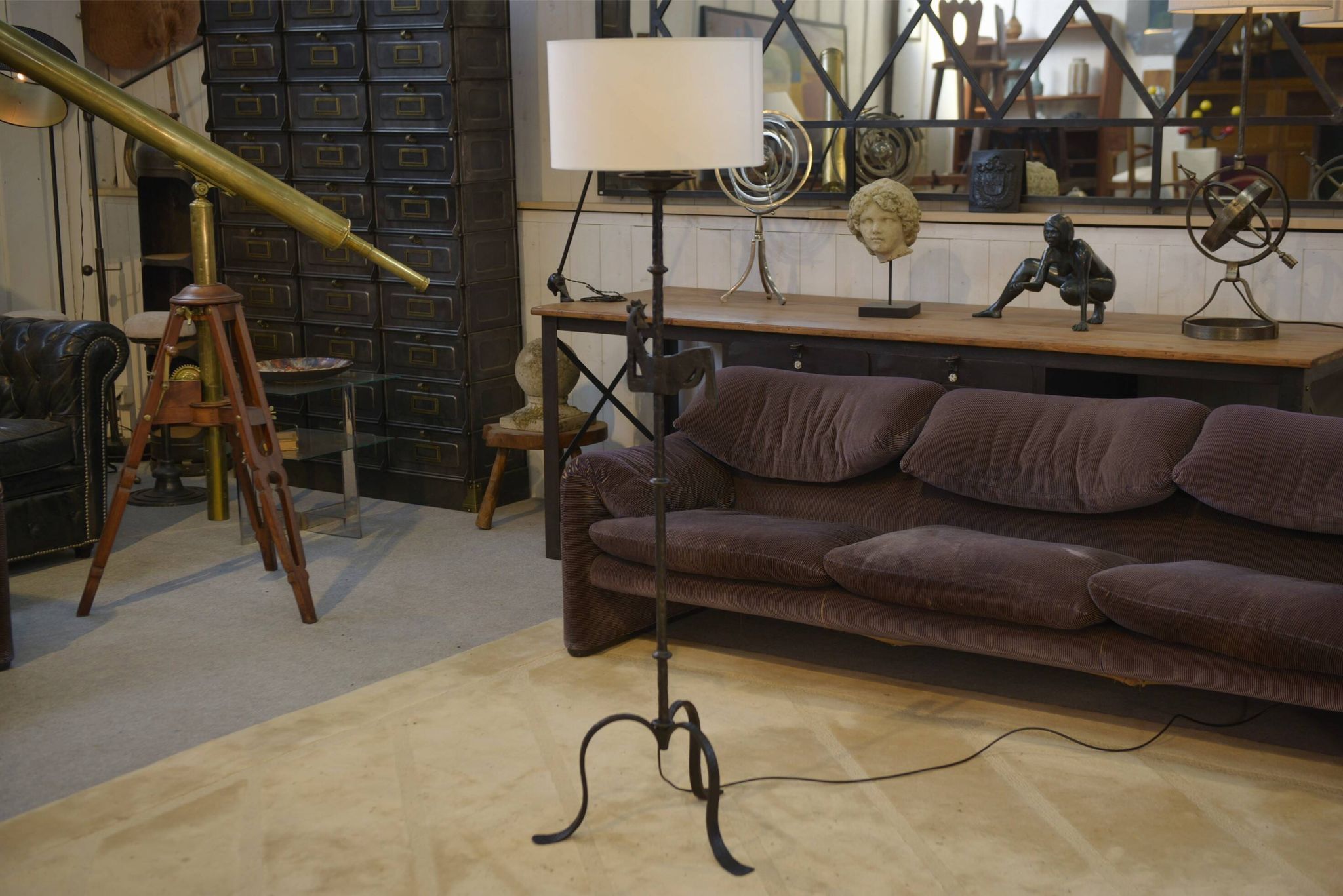 Wrought iron floor lamp in the style of the Marolles workshops from the 1950s.