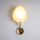 Arnold Wiigs wall lamp from plastic and brass