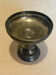 Vintage coupe on a patinated silver-plated metal stand.