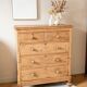 Large renovated antique English chest of drawers in solid pine.