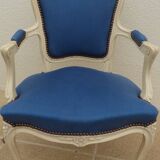 Cabriolet armchair in lacquered wood trimmed in blue satin, Louis XV style