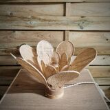 Flower table lamp made of rattan and raffia petals