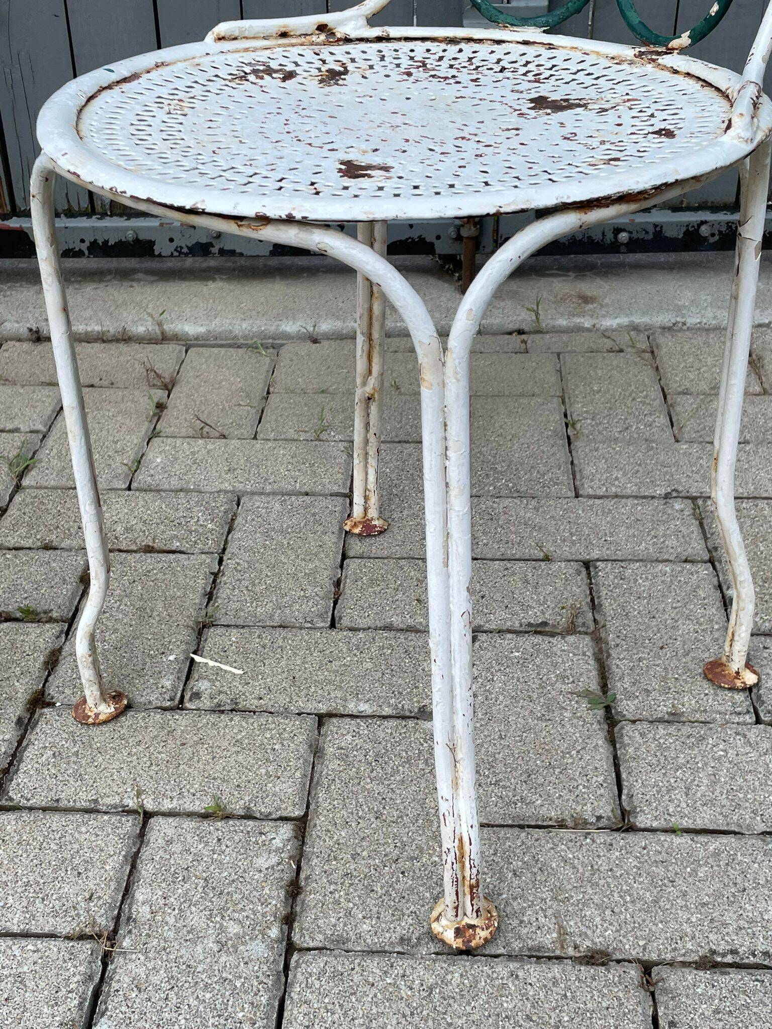 pair of antique wrought iron garden chairs