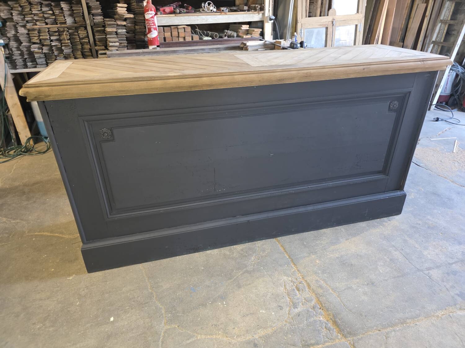 Chevron-patterned oak workbench