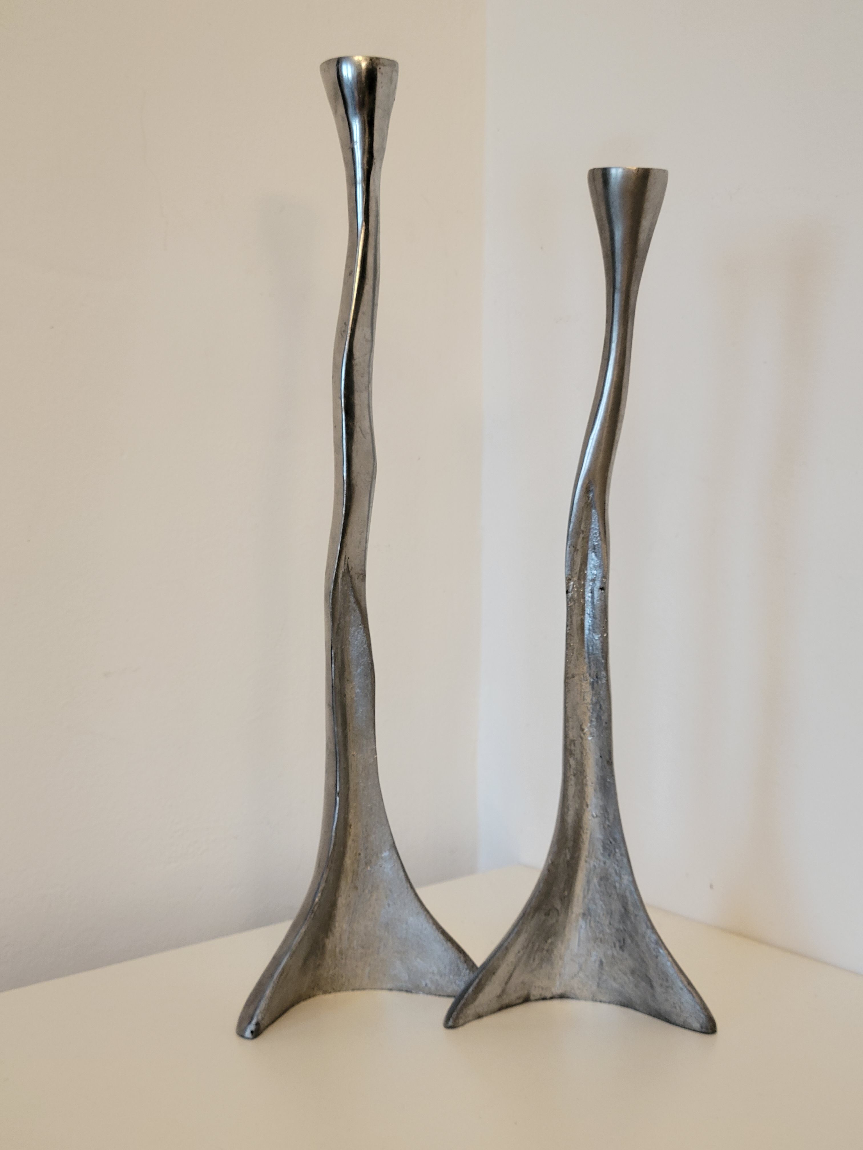 Pair of brutalist metal candlesticks in organic shape sleek design