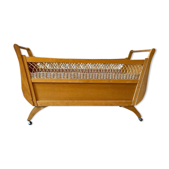 Children's bed in wood and wicker woven on wheels 1960